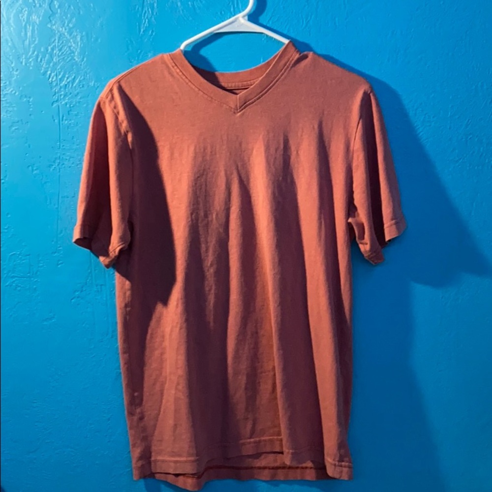 Slightly worn orange v-neck t-shirt